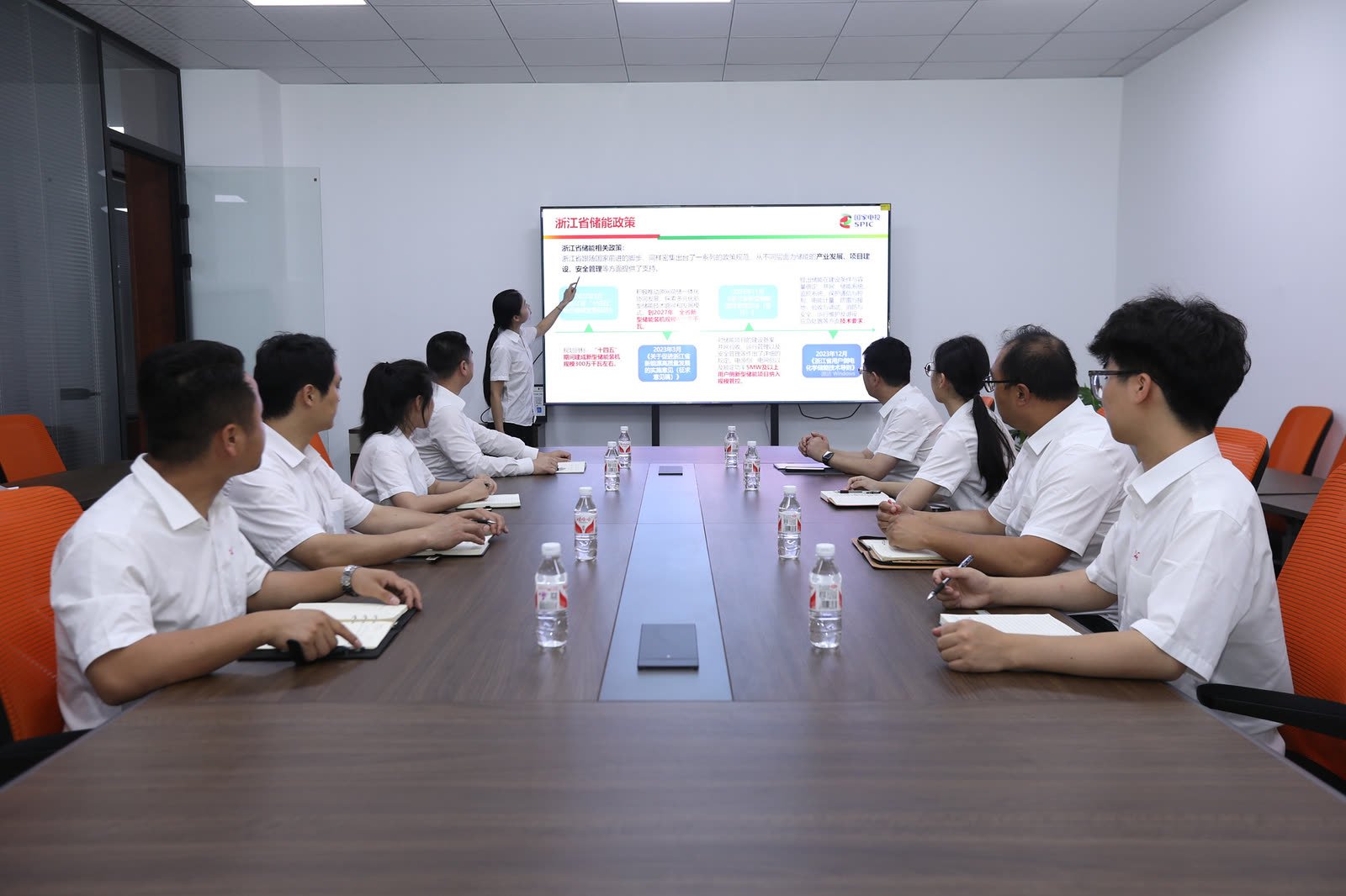 HQESS team discussion in a meeting room